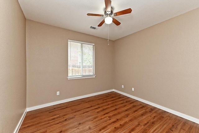 3705 Derby Trl, Round Rock, TX 78681 - unfurnished room with wood finished floors and a ceiling fan