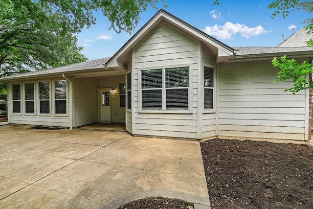 3705 Derby Trl, Round Rock, TX 78681 - rear view of house with a patio area and a shingled roof