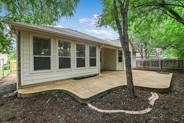 3705 Derby Trl, Round Rock, TX 78681 - back of property featuring a patio area, a fenced backyard, and roof with shingles