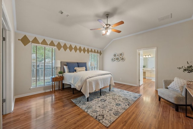 bedroom featuring crown molding, baseboards, and visible vents