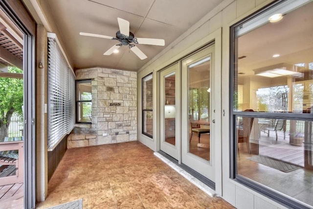 unfurnished sunroom with french doors