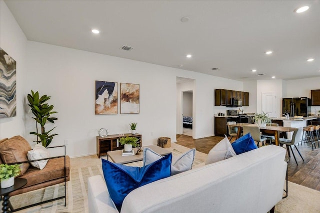 15005 Bajada Rd, Manor, TX 78653 - living area with recessed lighting and baseboards