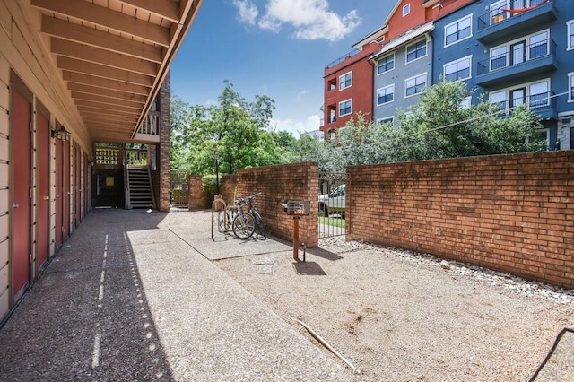 view of patio featuring fence