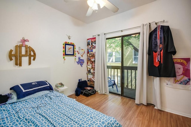 bedroom with baseboards, ceiling fan, wood finished floors, and access to exterior