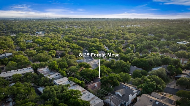 aerial view with a wooded view