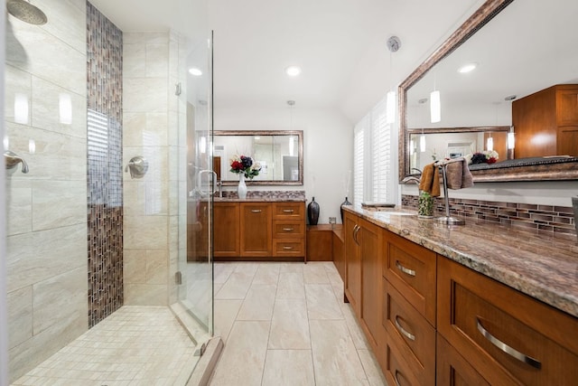 bathroom with vanity, recessed lighting, tile patterned floors, and a stall shower