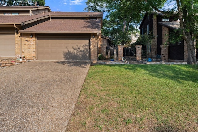 view of front of home with a garage, brick siding, fence, a front lawn, and concrete driveway
