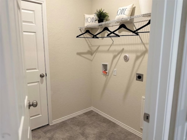 clothes washing area with laundry area, hookup for a washing machine, baseboards, and hookup for an electric dryer