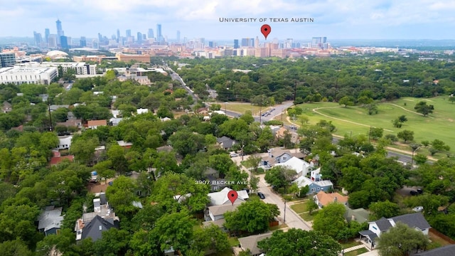 birds eye view of property with a view of city