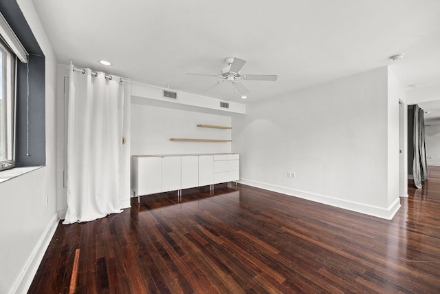 unfurnished living room featuring a ceiling fan, baseboards, recessed lighting, wood finished floors, and visible vents
