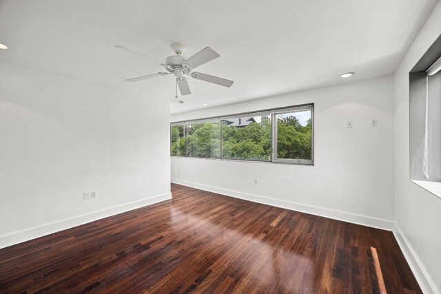 unfurnished room featuring baseboards, wood-type flooring, a ceiling fan, and recessed lighting