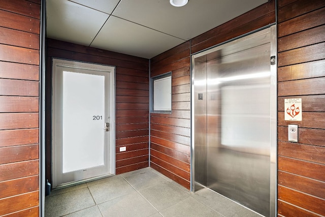 entrance to property featuring elevator