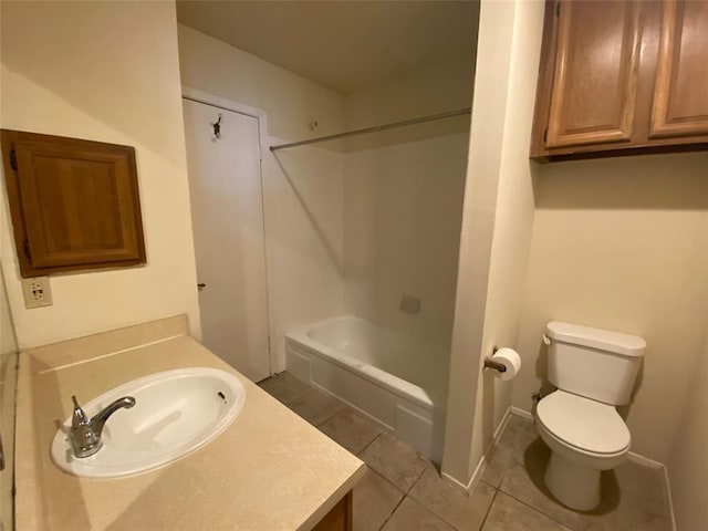 full bath with toilet, tile patterned floors, washtub / shower combination, and vanity