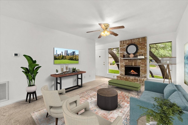 8301 Summer Side Dr Unit 167, Austin, TX 78759 - living area with carpet floors, ceiling fan, a brick fireplace, and baseboards