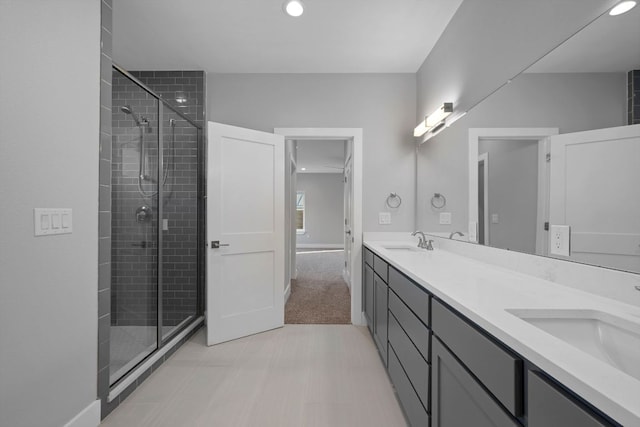 3503 Constitution Dr, Lago Vista, TX 78645 - bathroom with double vanity, a stall shower, and recessed lighting