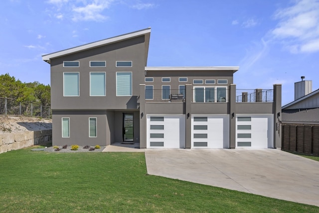 3503 Constitution Dr, Lago Vista, TX 78645 - modern home featuring stucco siding, concrete driveway, a balcony, and a garage