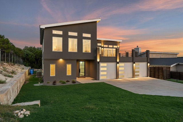 3503 Constitution Dr, Lago Vista, TX 78645 - modern home with a balcony, stucco siding, and driveway