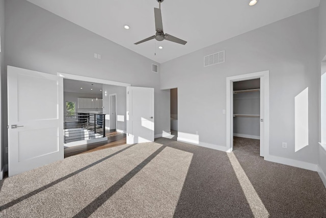 3503 Constitution Dr, Lago Vista, TX 78645 - unfurnished bedroom with high vaulted ceiling, recessed lighting, a spacious closet, carpet flooring, and a ceiling fan