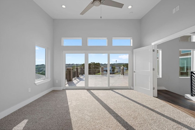 3503 Constitution Dr, Lago Vista, TX 78645 - spare room featuring a ceiling fan, a high ceiling, healthy amount of natural light, and recessed lighting