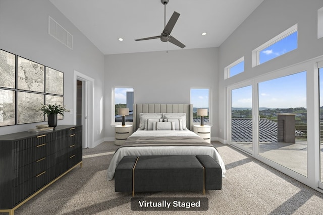 3503 Constitution Dr, Lago Vista, TX 78645 - bedroom featuring a towering ceiling, access to outside, carpet, a ceiling fan, and recessed lighting