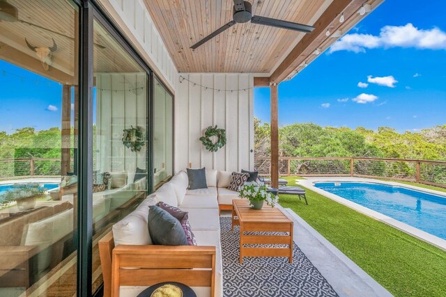 balcony featuring ceiling fan and outdoor lounge area