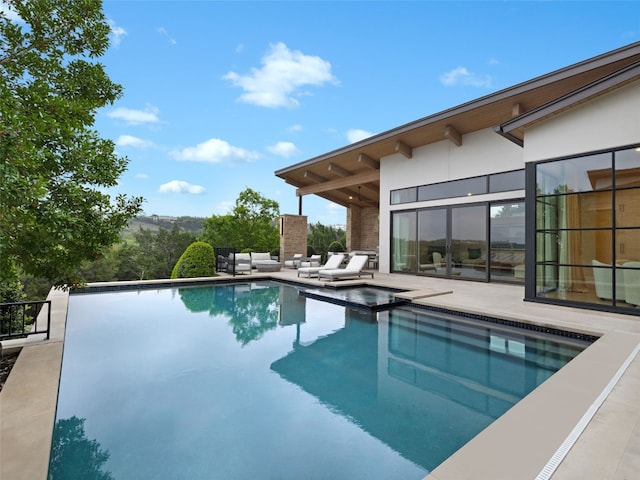 4701 Peralta Ln, Austin, TX 78735 - view of pool featuring a pool with connected hot tub and a patio
