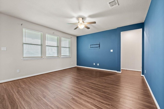 13601 Primrose Petal Dr, Manor, TX 78653 - unfurnished room featuring a ceiling fan, wood finished floors, and baseboards