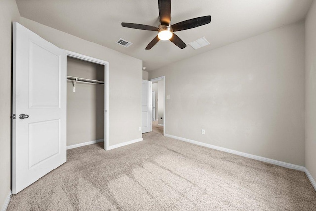 13601 Primrose Petal Dr, Manor, TX 78653 - unfurnished bedroom with light colored carpet, baseboards, and a closet