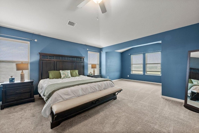 13601 Primrose Petal Dr, Manor, TX 78653 - bedroom with carpet flooring, vaulted ceiling, a ceiling fan, and baseboards