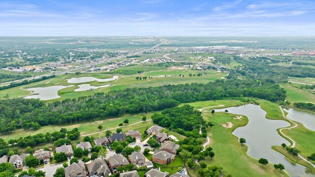 bird's eye view featuring a residential view, a water view, and golf course view