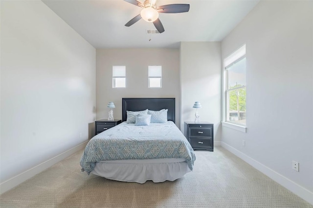 2228 Williams Lakeshore Dr, Kingsland, TX 78639 - bedroom featuring baseboards, multiple windows, and visible vents