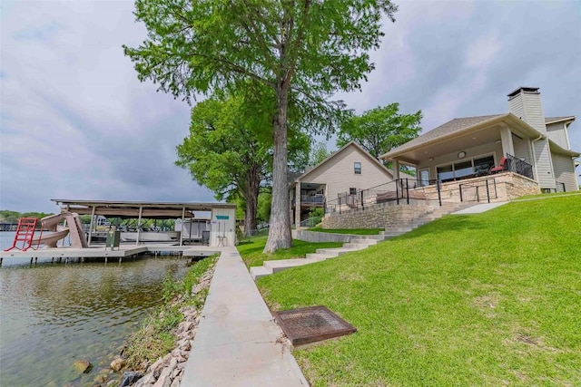 2228 Williams Lakeshore Dr, Kingsland, TX 78639 - dock area featuring a lawn, a water view, and boat lift