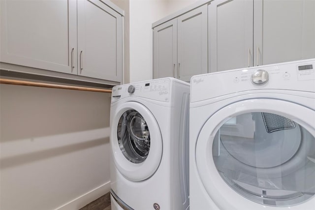 2228 Williams Lakeshore Dr, Kingsland, TX 78639 - washroom with cabinet space and washing machine and clothes dryer