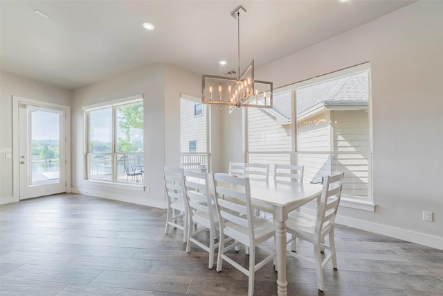 2228 Williams Lakeshore Dr, Kingsland, TX 78639 - dining area with recessed lighting, baseboards, a chandelier, and wood finished floors