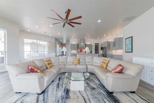 2228 Williams Lakeshore Dr, Kingsland, TX 78639 - living room with light wood-style floors, a ceiling fan, recessed lighting, and visible vents