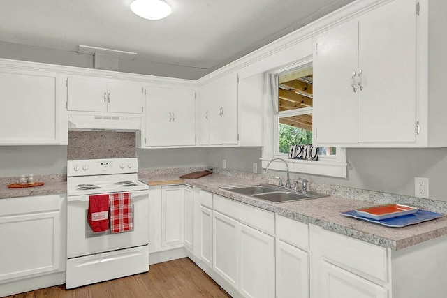 kitchen with a sink, white electric range oven, under cabinet range hood, and white cabinetry