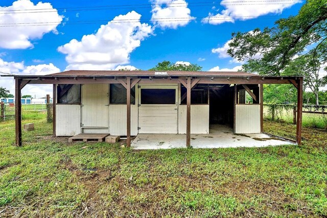 view of outbuilding with an exterior structure and an outbuilding