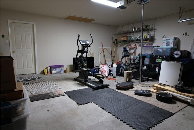 workout area with a garage