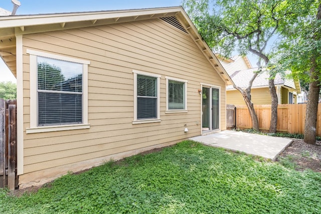2509 Lightfoot Trl, Austin, TX 78745 - back of house featuring a patio