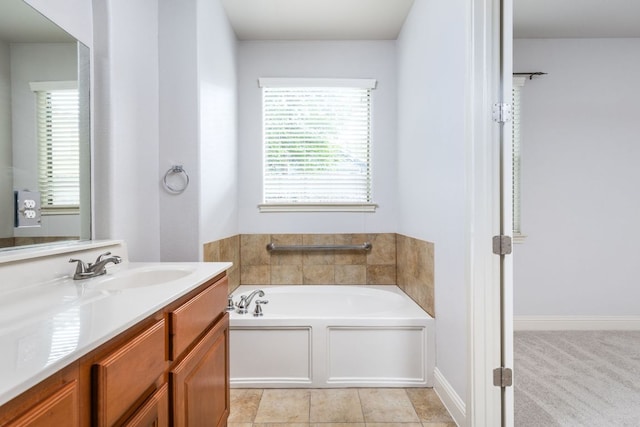 full bath with a bath and vanity