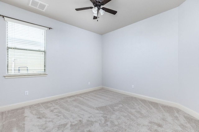 2509 Lightfoot Trl, Austin, TX 78745 - unfurnished room with carpet and a ceiling fan