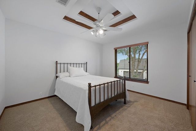 bedroom featuring a ceiling fan, baseboards, visible vents, and carpet