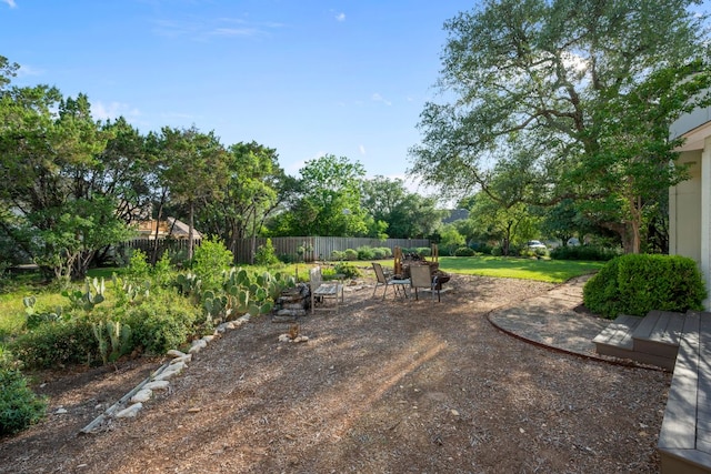 view of yard with a patio and fence