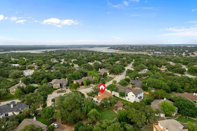 bird's eye view featuring a residential view and a water view