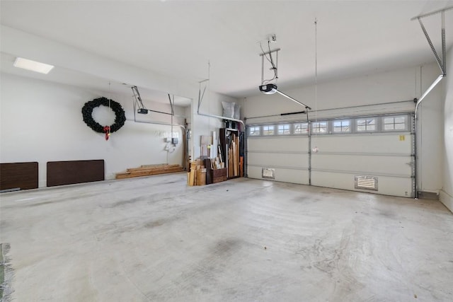 5217 Cedro Elm Dr, Austin, TX 78738 - garage with a garage door opener