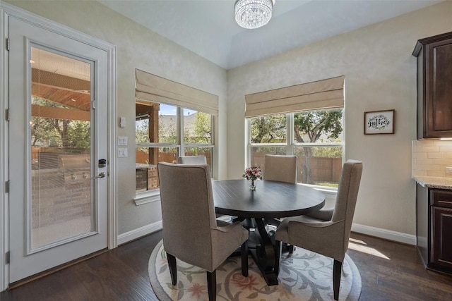 5217 Cedro Elm Dr, Austin, TX 78738 - dining space with dark wood-style floors and a chandelier