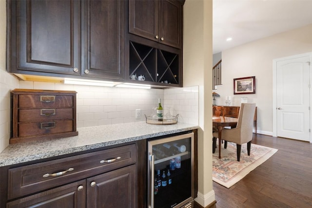 bar featuring recessed lighting, baseboards, tasteful backsplash, wine cooler, and dark wood-style floors