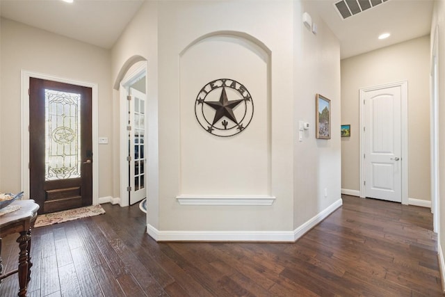 foyer with recessed lighting, baseboards, visible vents, and dark wood-style floors