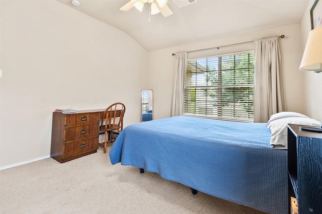 bedroom featuring baseboards, a ceiling fan, carpet, and lofted ceiling