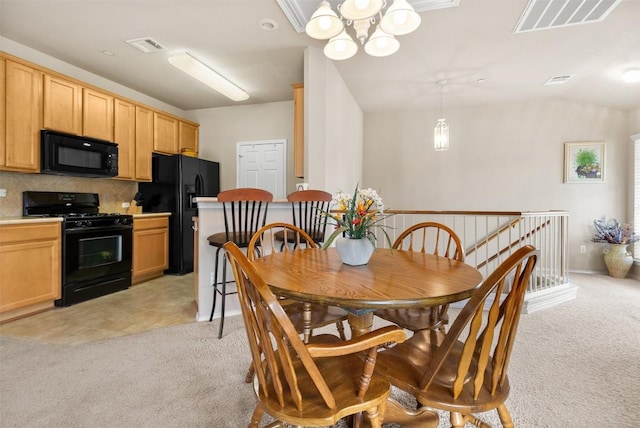 dining area featuring visible vents, lofted ceiling, light carpet, and an inviting chandelier